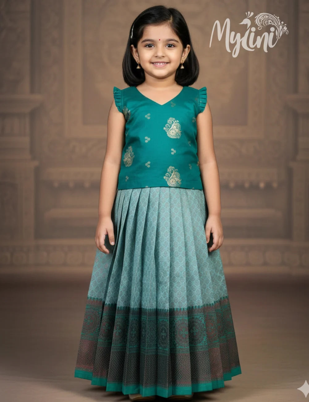 Young girl wearing a green traditional outfit with a blurred decorative background